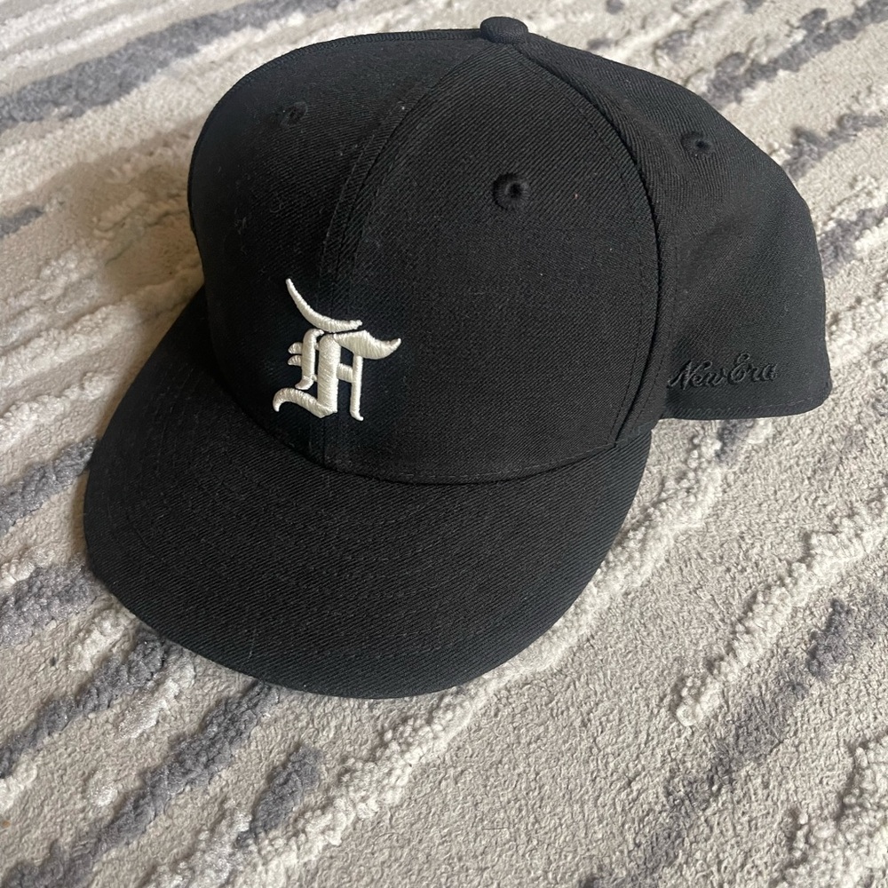 New Era Black Cap with White Embroidery